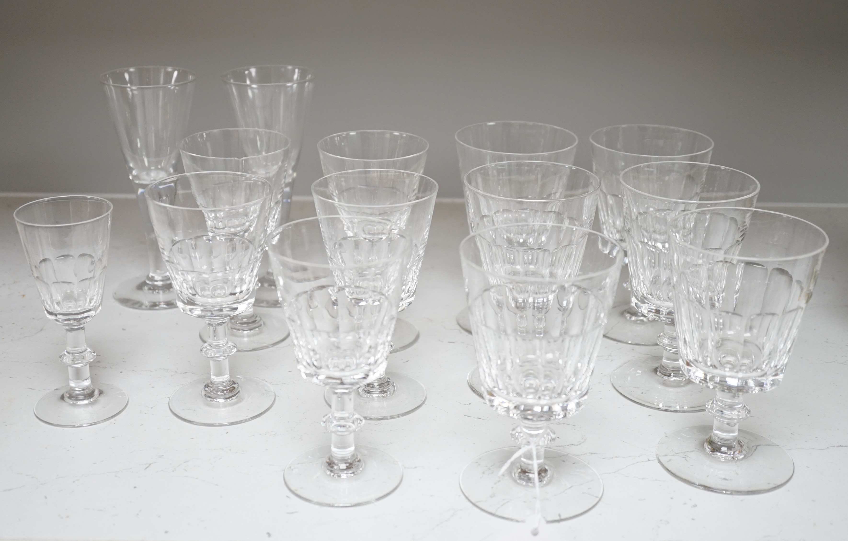 A set of nine cut drinking glasses, five similar glasses and three others